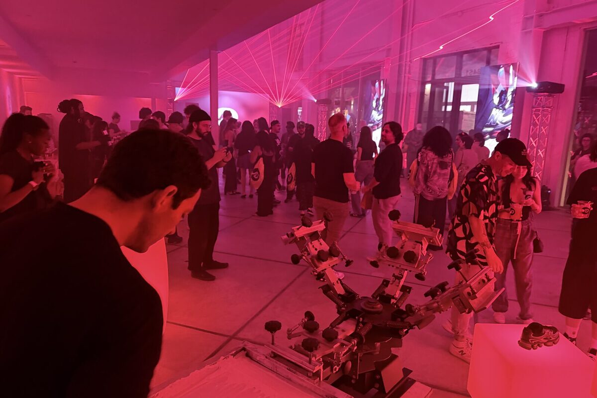 Glowing print station set against an evening event backdrop