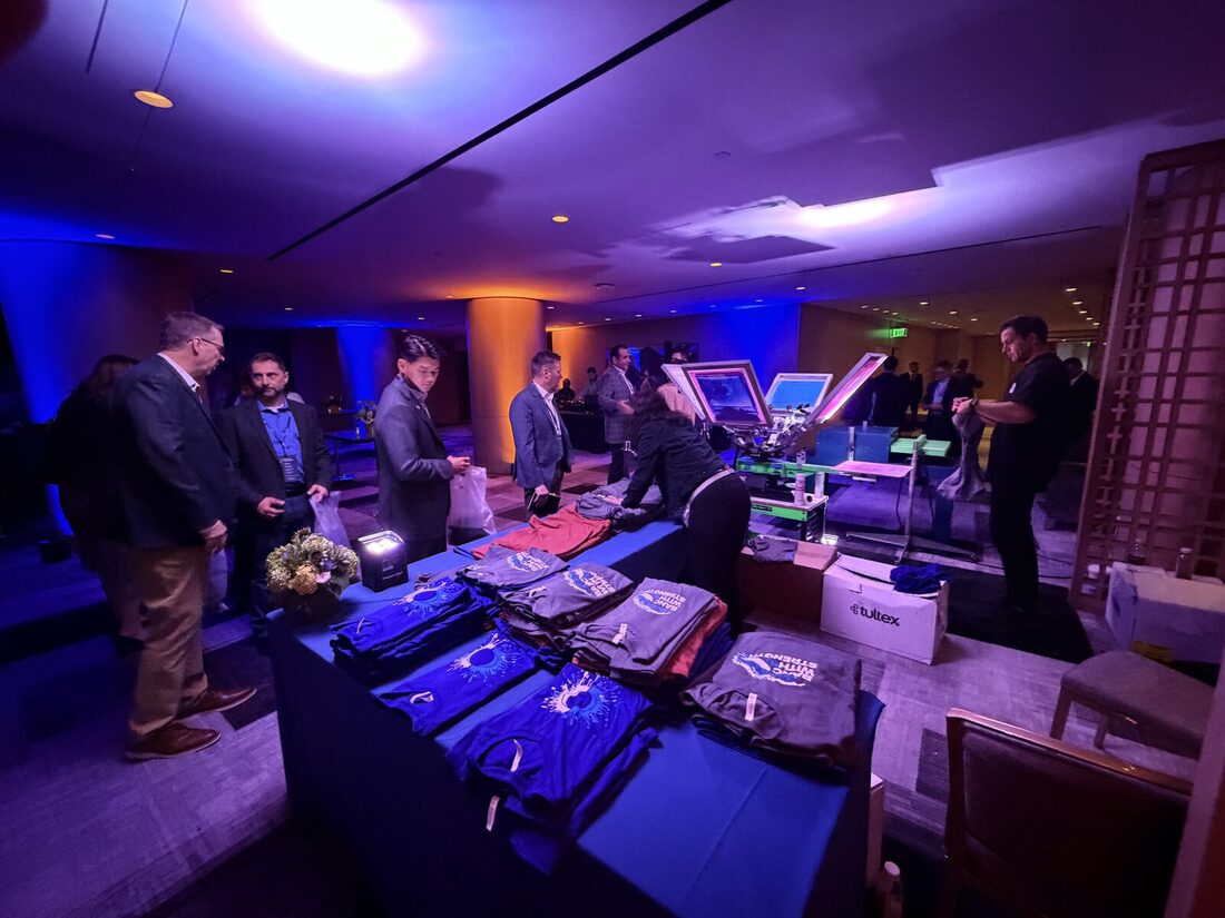 Lounge-style live printing station styled for an evening event